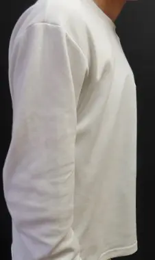 Vacuum bell worn under clothing — side view